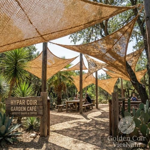 shade sail for cafe garden using natural coir and hypar tensile design