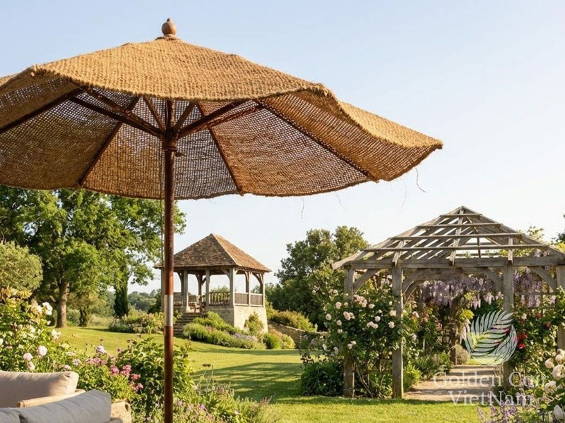 parasol in a garden with pergola and gazebo in background parasol vs umbrella