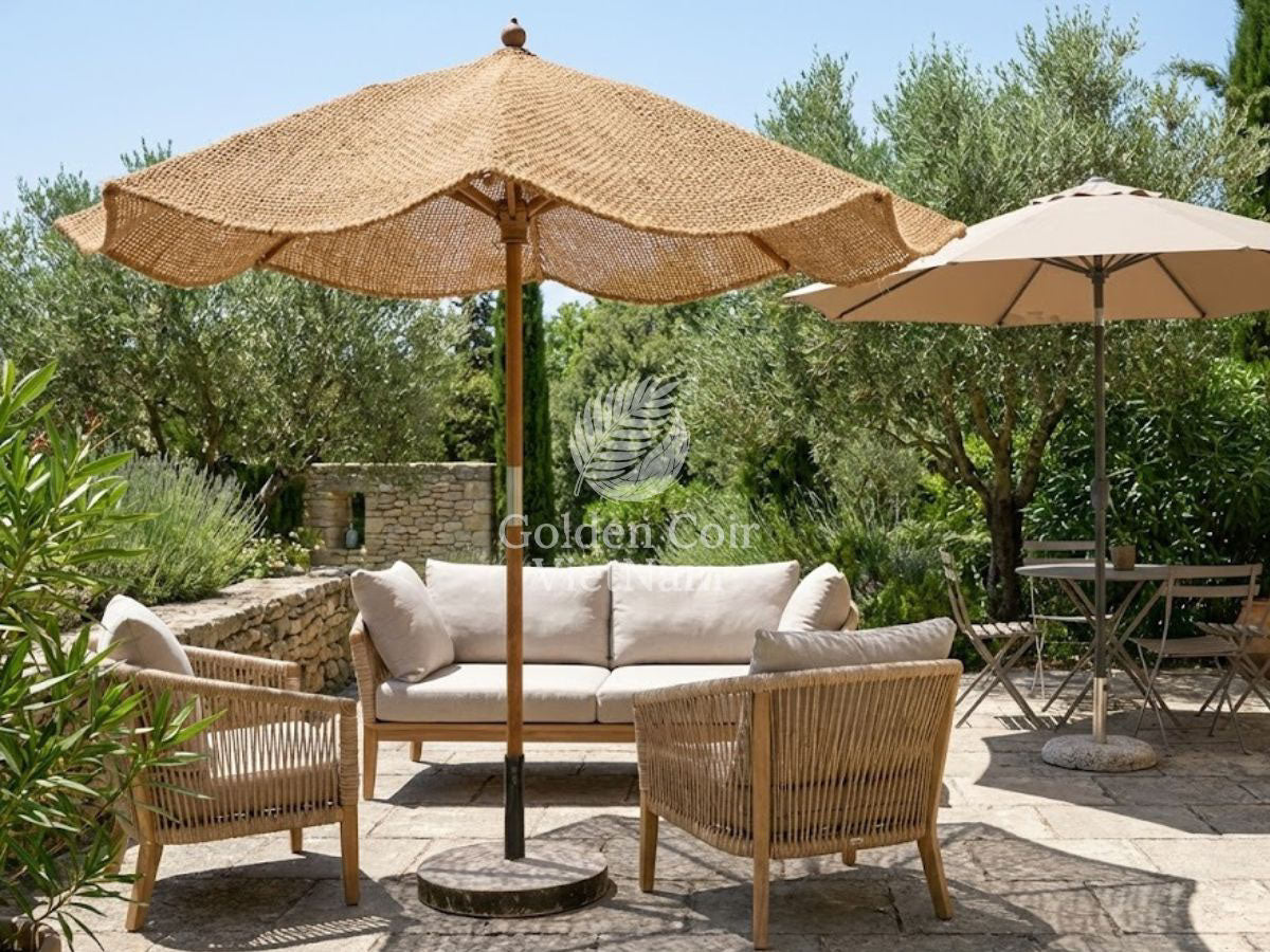 Coco thatch umbrella canopy for temperature reducing backyard shade on a sunny stone patio